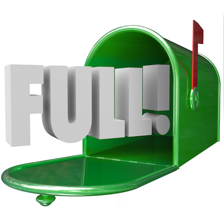 Full Word in 3d letters in a green metal mailbox to illustrate junk messages overflowing an email inbox