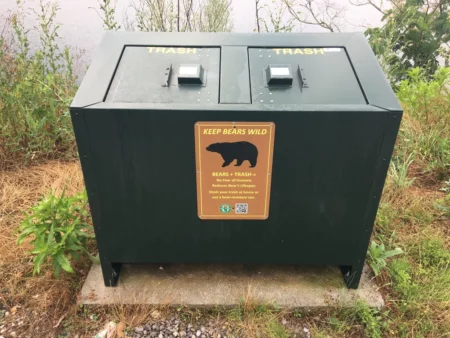 A bear-proof trash container.